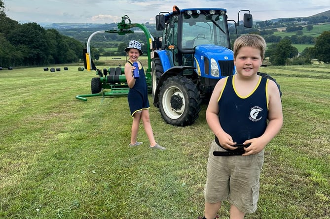 Claire and Stephen's children, Alaw, 10, and Shon, 8, help out on the farm
