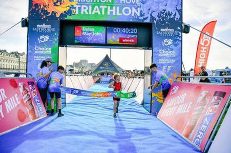 Dylan crosses the finishing line