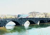 Dyfi Bridge reopens as water level drops