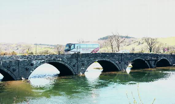 Dyfi Bridge reopens as water level drops