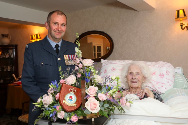 THE 102nd birthday of one the few living RAF veterans from the Second World War was celebrated today with a presentation from the RAF of today at her West Wales home.
Pauline Penrose served in the RAF from 1942 to 1945 working as a Plotter. These were the women tasked with tracking enemy aircraft were approaching the British coast so RAF fighters could be scrambled to attack them.
The 102-year-old is one of only a handful of RAF veterans from the Second World War left in Wales. She was presented with an arrangement of flowers by the Commanding Officer of Number 614 (County of Glamorgan) Squadron, the only RAF Reserves unit in Wales. He was joined by two other members of the squadron.
