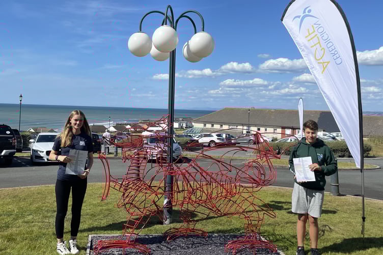 Bronwen Thomas and Steffan Williams receiving their Ceredigion Sports Awards for sailing back in July