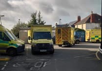 Ambulances queue outside entrance to Bronglais A&E