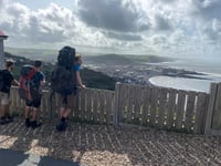 Folk duo hit halfway point of coast path walk in Ceredigion