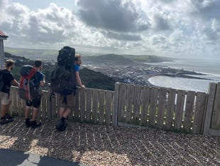 Folk duo hit halfway point of coast path walk in Ceredigion