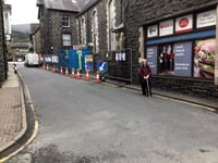 Road outside ceiling collapse shop reopens
