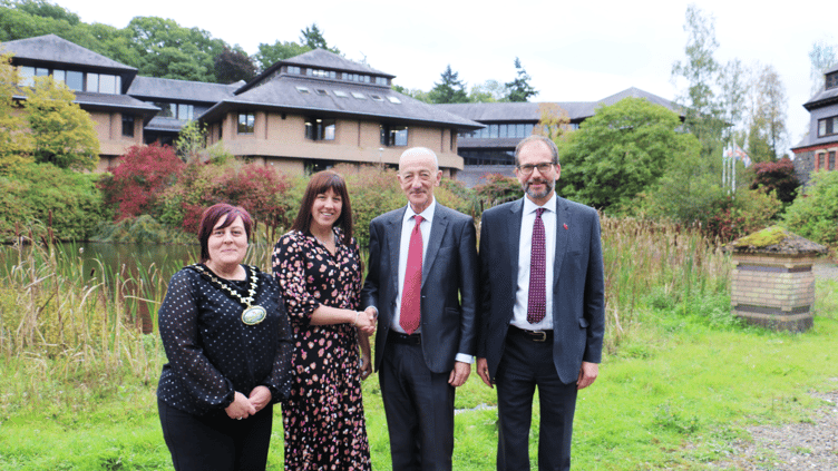Emma Palmer is welcomed into post by Interim Chief Executive Jack Straw. Also pictured (L to R) Cllr Beverly Baynham and Cllr James Gibson-Watt.