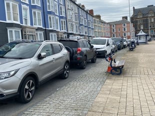 Charging for parking on Aber prom by Easter