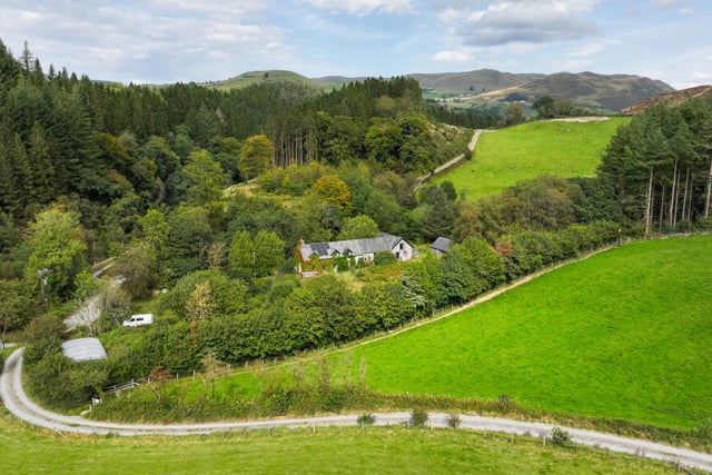 Period cottage for sale in National Trust estate beside Cambrian hills
