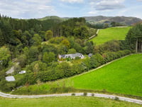 Period cottage for sale in National Trust estate beside Cambrian hills