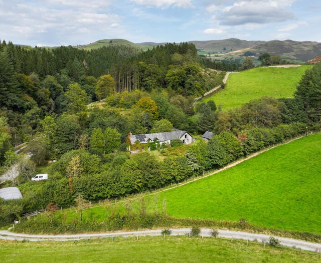 Period cottage for sale in National Trust estate beside Cambrian hills