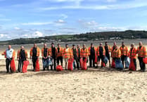 Openreach engineers help clean up Borth beach