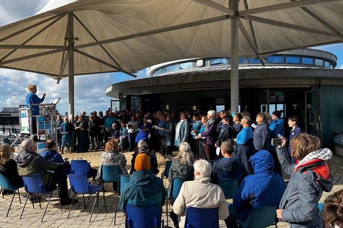 The 100-strong choir at the bandstand on Aberystwyth promenade