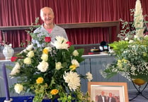 Flowers and music take centre stage for society's meeting