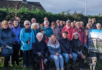 Residents hold protest as council set to refuse Village Green plan