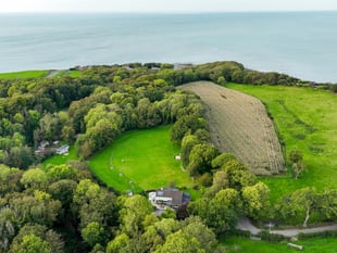 Seaside home for sale comes with woodlands and  campsite space