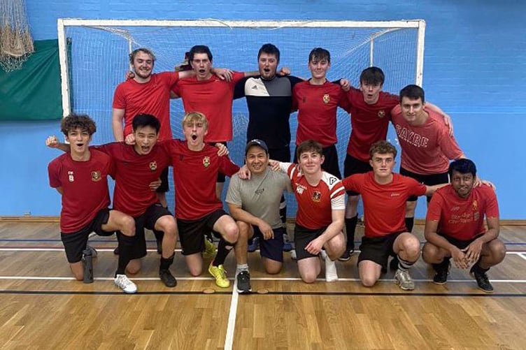 Aberystwyth University Futsal team won their first game on 5 November. They are pictured with coach Juan Segovia