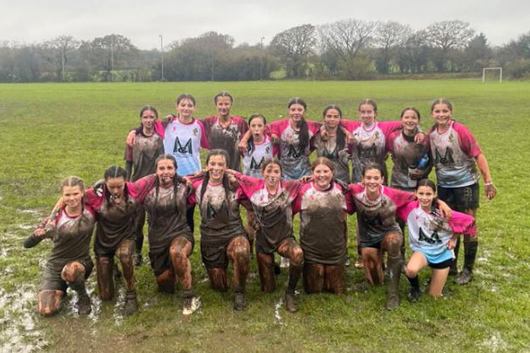 Bae Ceredigion Dolphins Under 14s won a tough game played in tough conditions against their Mynydd Mawr counterparts