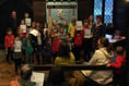 Dozens of children complete reading challenge