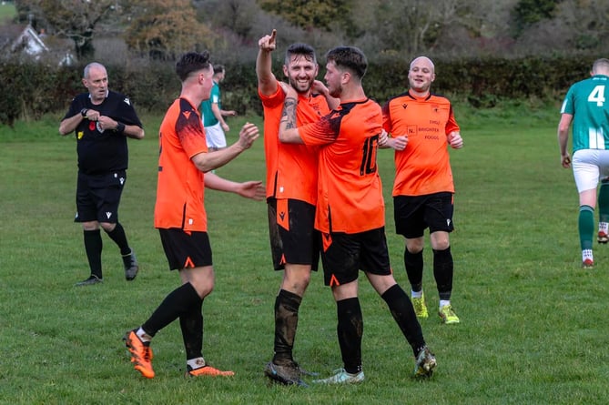Captain Tom Allen is congratulated after scoring Tywyn’s second goal