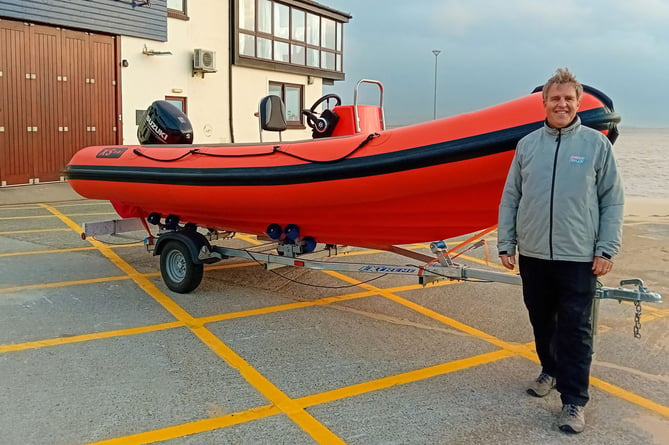 Huw Jones-Williams with the new safety boat Aberdovey Yacht Club Clwb Hwylio Aberdyfi
