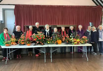 Floral art skills on display at autumn-themed gathering