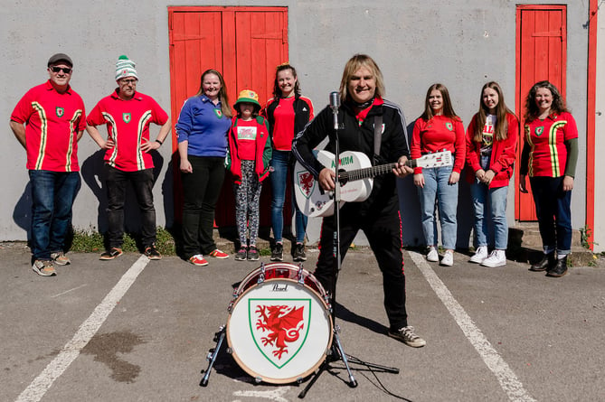 WREXHAM, WALES - 02 APRIL, 2021: Wales fans celebrate during the the filming of the Wales Euro 2020 Song with Mike Peter and the Alarm. (Pic by John Smith/FAW)