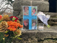 Road remains closed as tributes pour in for four teens