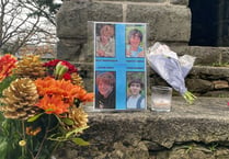 Road remains closed as tributes pour in for four teens