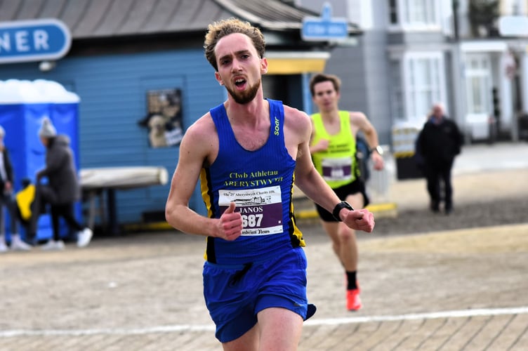 Janos has the finish line in his sights with Ollie close behind him