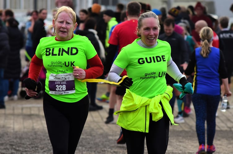 Mel Gaul and Louise Jenknis approach the finish line