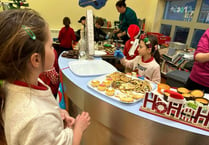 Pupils' festive café raises £470 for Bronglais Hospital