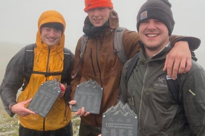 Ryan Doughty, Iestyn Owens and Sion Williams on top of their 100th Welsh peak, Plynlimon