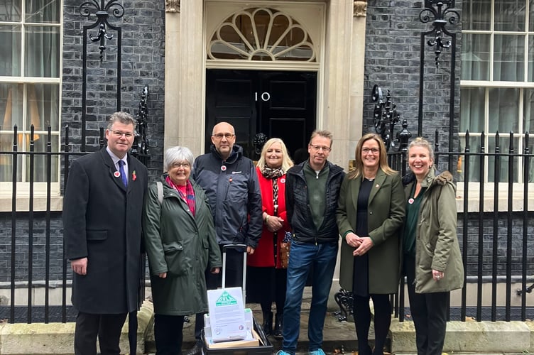 The NFSP presenting the petition to Downing Street (from left): Tim Boothman (NFSP chair), Marion Fellows MP, Calum Greenhow (NFSP CEO), Sue Edgar (NFSP Non-Executive Director), Tim Allen (Kington Main postmaster), Jenny Cain (Barnards Green postmaster), Ruth Buckley-Salmon (NFSP Public Affairs Manager)