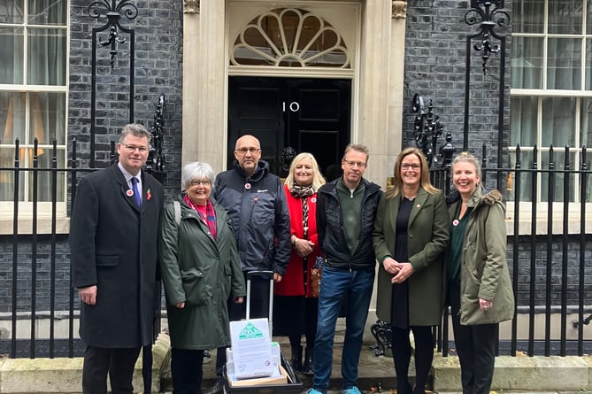 The NFSP presenting the petition to Downing Street (from left): Tim Boothman (NFSP chair), Marion Fellows MP, Calum Greenhow (NFSP CEO), Sue Edgar (NFSP Non-Executive Director), Tim Allen (Kington Main postmaster), Jenny Cain (Barnards Green postmaster), Ruth Buckley-Salmon (NFSP Public Affairs Manager)