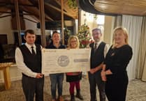 Aberystwyth Crematorium presents cheque to charity and hosts highest attended service