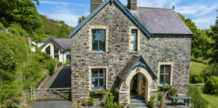 Former vicarage for sale sits in woodlands with converted coach house