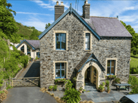 Former vicarage for sale sits in woodlands with converted coach house