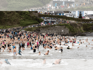 Swimmers brave the New Year chill for Cancer Research