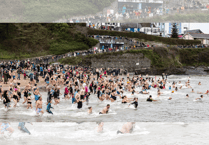 Swimmers brave the New Year chill for Cancer Research