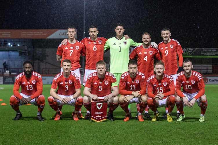 ALTINCHAM, ENGLAND - 21 MARCH 2023 - Cymru team lineup at England C vs Cymru C at Altrincham's J Davison Stadium, Altrincham (Pic by Nik Mesney/FAW)