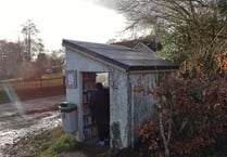 Community transforms disused bus shelter into library