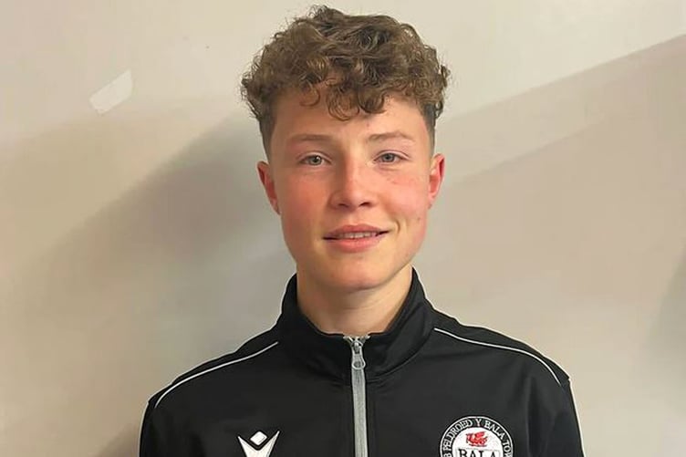 Young Bala Town midfielder Tom Hughes