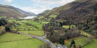 Historic hotel for sale is at the base of a mountain in the Mach Loop