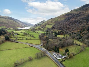 Historic hotel for sale is at the base of a mountain in the Mach Loop