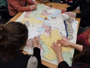 Mothers sew quilt to promote infant feeding discussions 