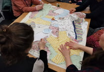 Mothers sew quilt to promote infant feeding discussions 