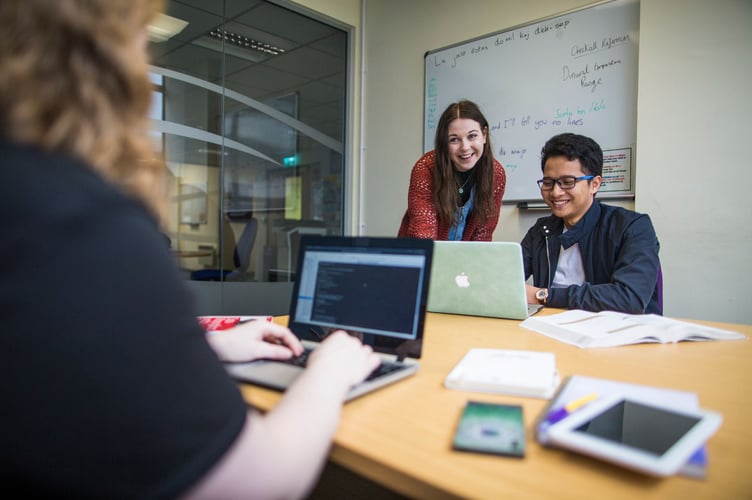 studying together, working as a team in the self contained study rooms in the postgraduate centre