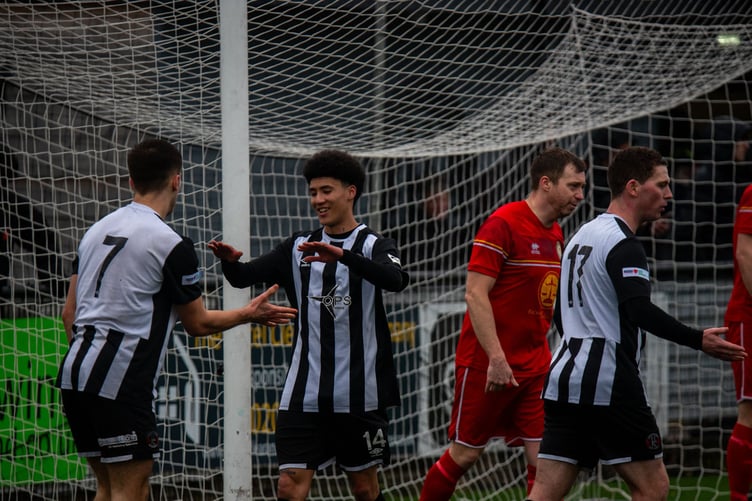 Alex Boss (second from left) scored a quickfire hat-trick for Llandudno against Llanidloes
