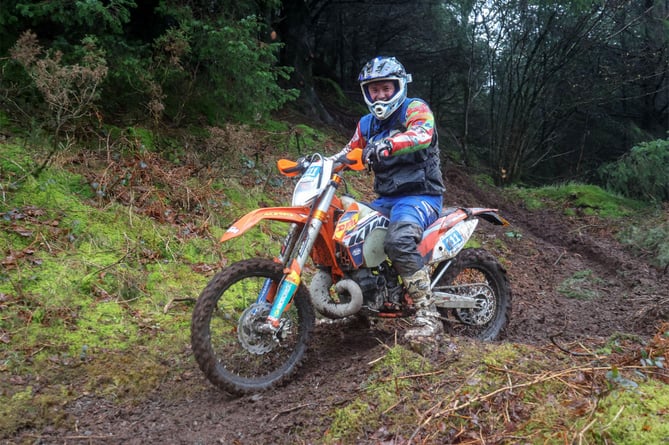 Barry Thomas from Coedybryn on his KTM 250 heads through the Crychan forest